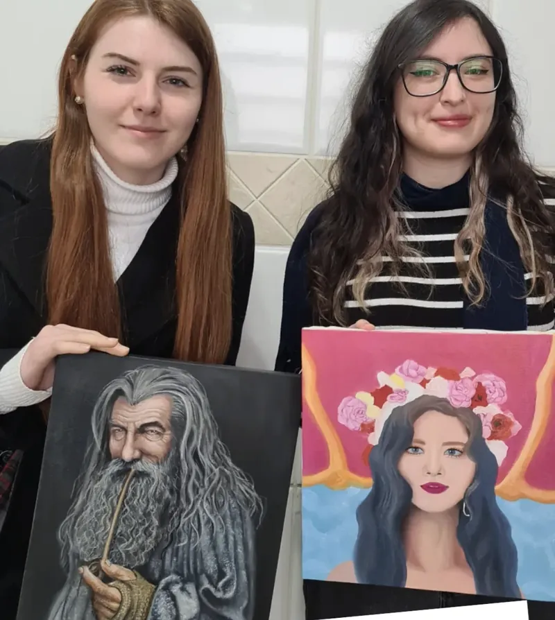 Students with their finished portraits